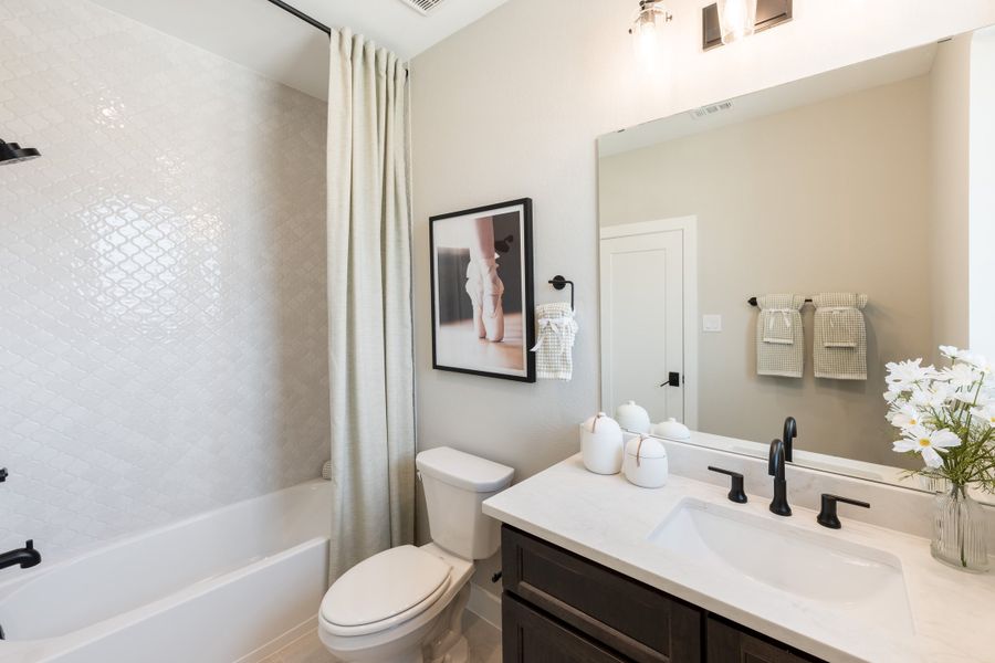 Representative furnished interior of a home built from the Camden by Tri Pointe Homes in Bridgeland, Cypress (Image 54).