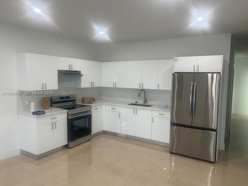 Furnished interior view inside a new home in , Miami (Image 7).