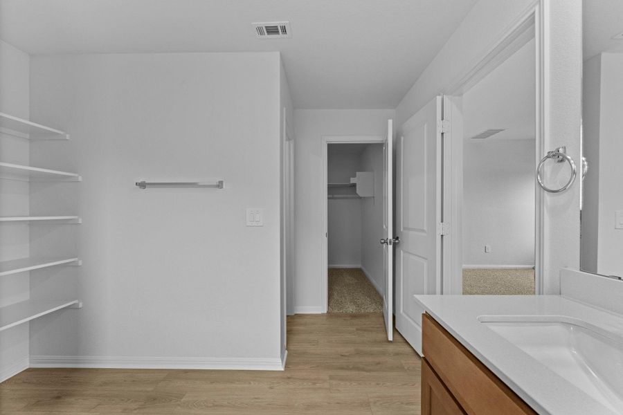 Furnished interior view inside a new home in Bar W Ranch, Leander (Image 8).