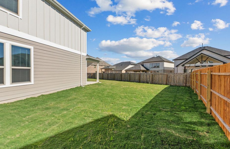 Exterior details and patio area of a home in Santa Rita Ranch, Liberty Hill (Image 31).
