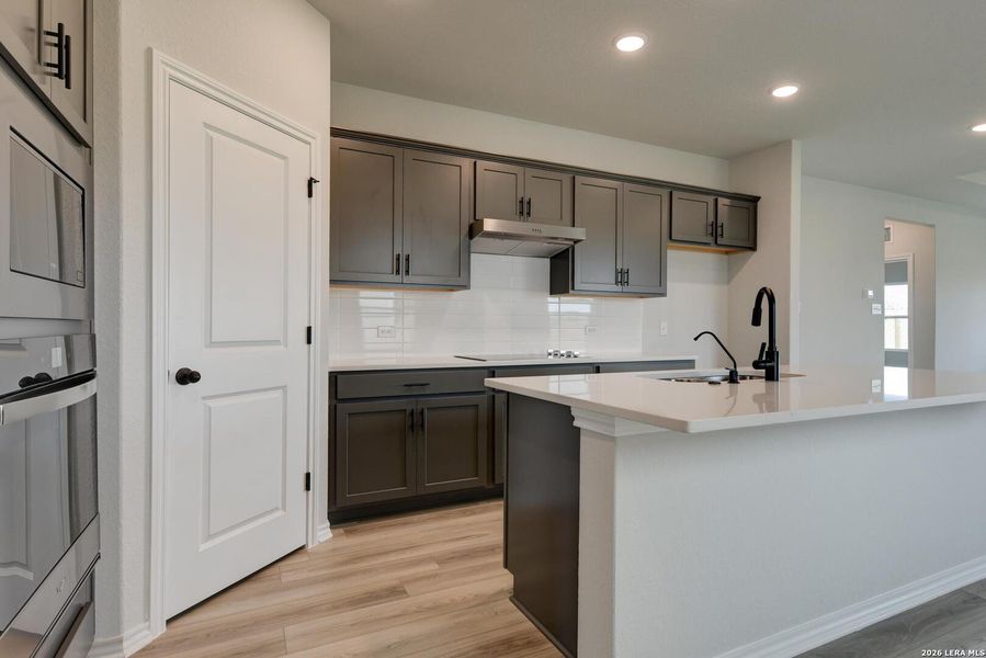 Furnished interior view inside a new home in Hennersby Hollow, San Antonio (Image 6).