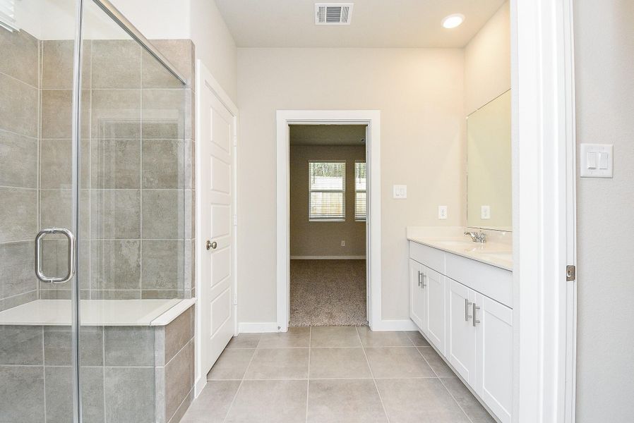 Furnished interior view inside a new home in Montgomery Oaks - Premier, Conroe (Image 35). Furnished interior view inside a new home in Montgomery Oaks - Premier, Conroe (Image 35).