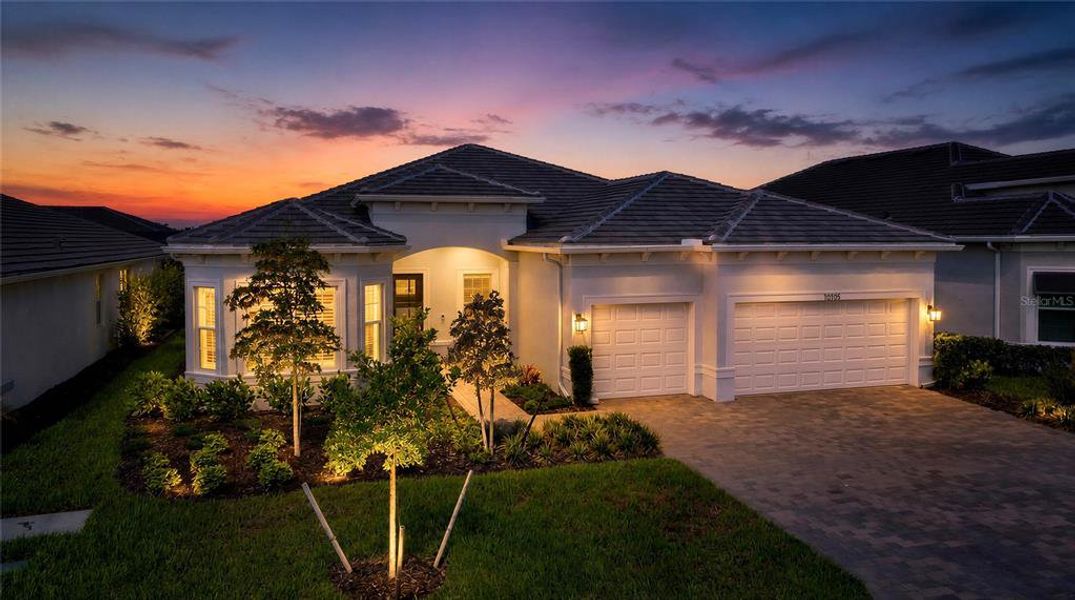 Front exterior of a new home in , Englewood, FL, highlighting curb appeal (Image 2).