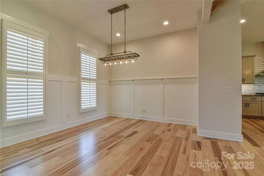 Dining room with accent wall.