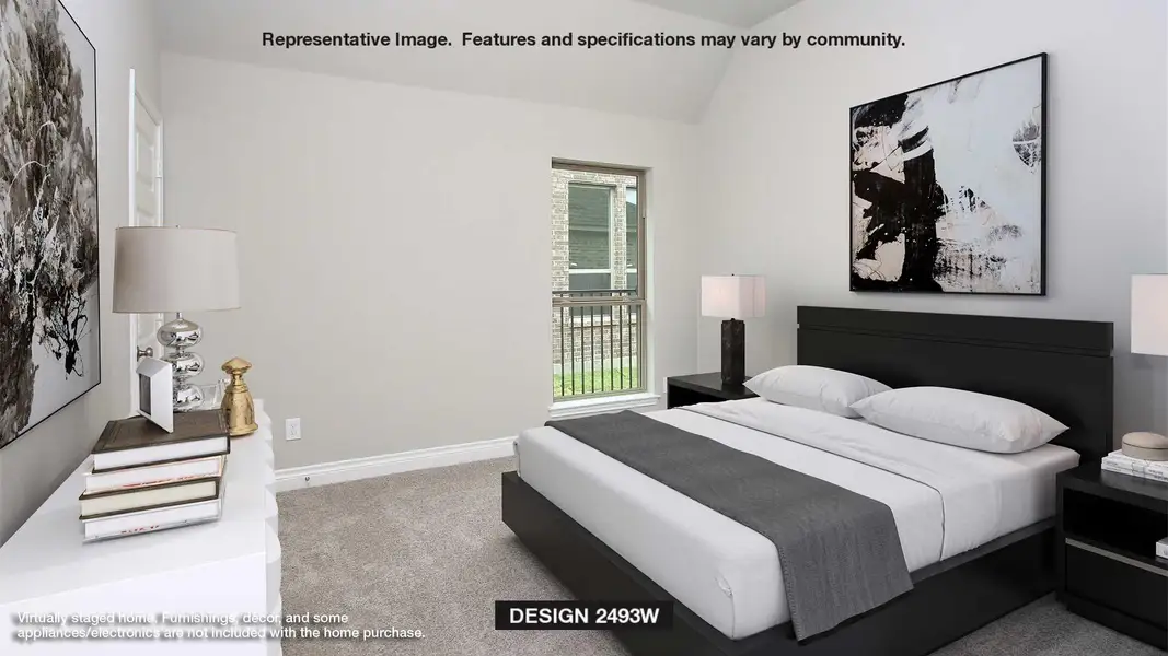 Carpeted bedroom with baseboards and vaulted ceiling