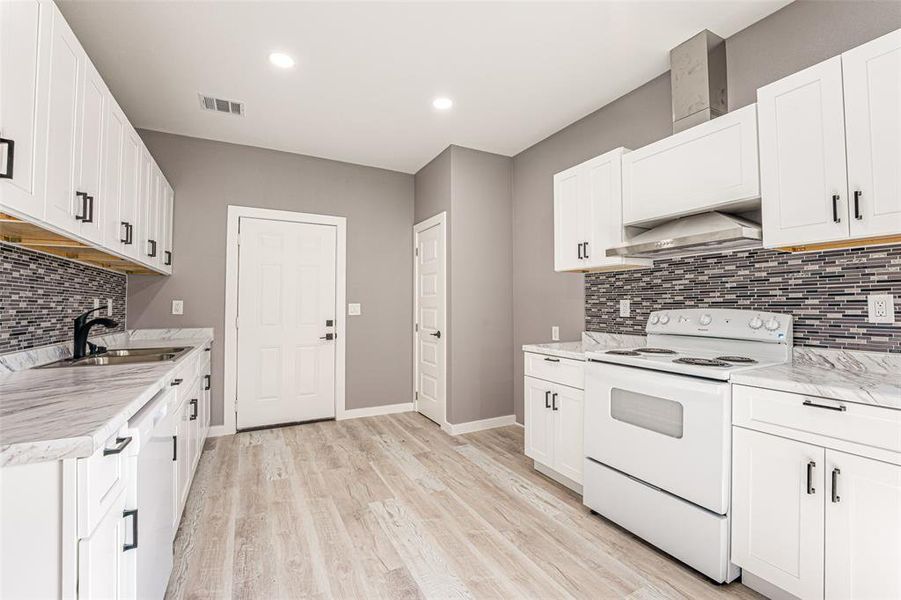 Furnished interior view inside a new home in , Rice (Image 6).