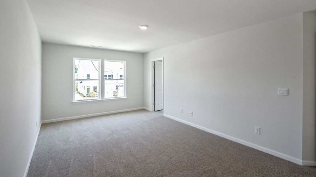 Spacious, unfurnished interior of a new home in Copper Run South, Durham (Image 22).