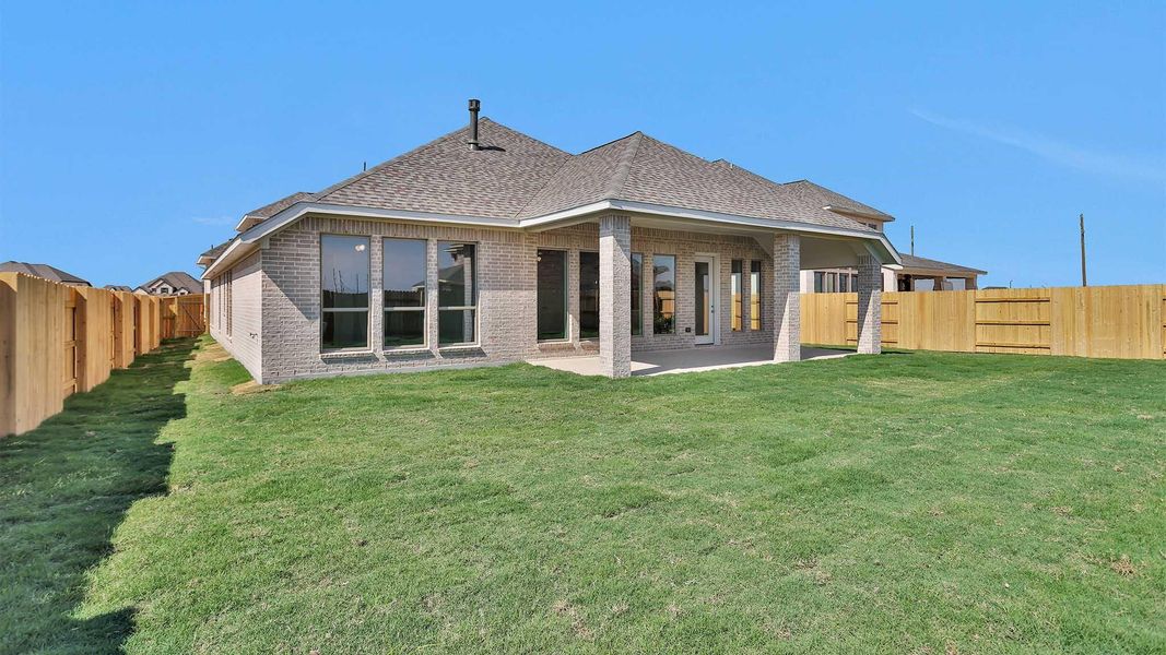 Exterior details and patio area of a home in Elyson 55', Katy (Image 3). Exterior details and patio area of a home in Elyson 55', Katy (Image 3).
