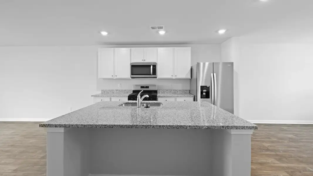 Furnished interior view inside a new home in Pine Hills Townhomes at Cane Bay, Summerville (Image 2). Furnished interior view inside a new home in Pine Hills Townhomes at Cane Bay, Summerville (Image 2).