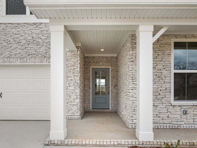 Exterior details and patio area of a home in Woods Crossing, Gallatin (Image 3).