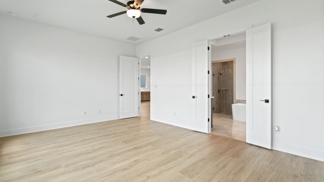 Representative unfurnished interior of a home built from the 2517F by Perry Homes in Turnleaf, Punta Gorda (Image 40).