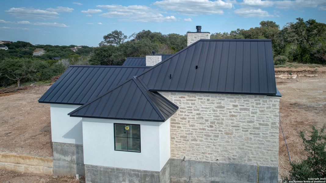 Front exterior of a new home in , New Braunfels, TX, highlighting curb appeal (Image 24). Front exterior of a new home in , New Braunfels, TX, highlighting curb appeal (Image 24).