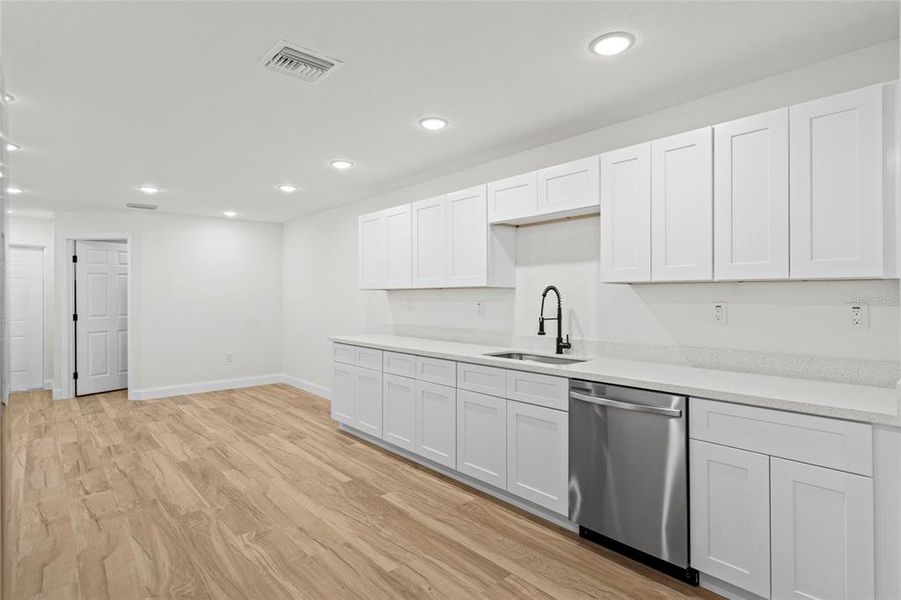 Furnished interior view inside a new home in , Okeechobee (Image 5).