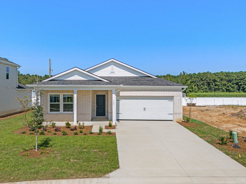 Front exterior of a new home in Cypress Ridge - The Coastline Series, Longs, SC, highlighting curb appeal (Image 2).