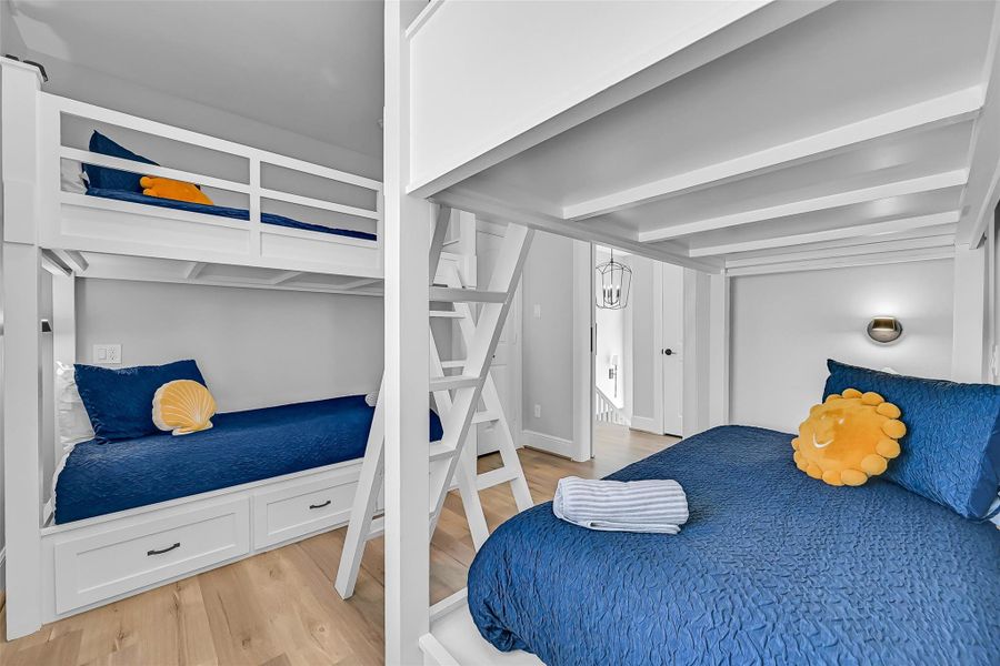 This custom bunk room creates a fun and memorable setup guests and kids will absolutely love. It’s a standout feature for vacation rental buyers.