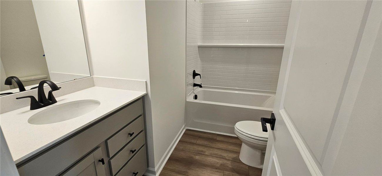 This bathroom features sleek fixtures and a modern