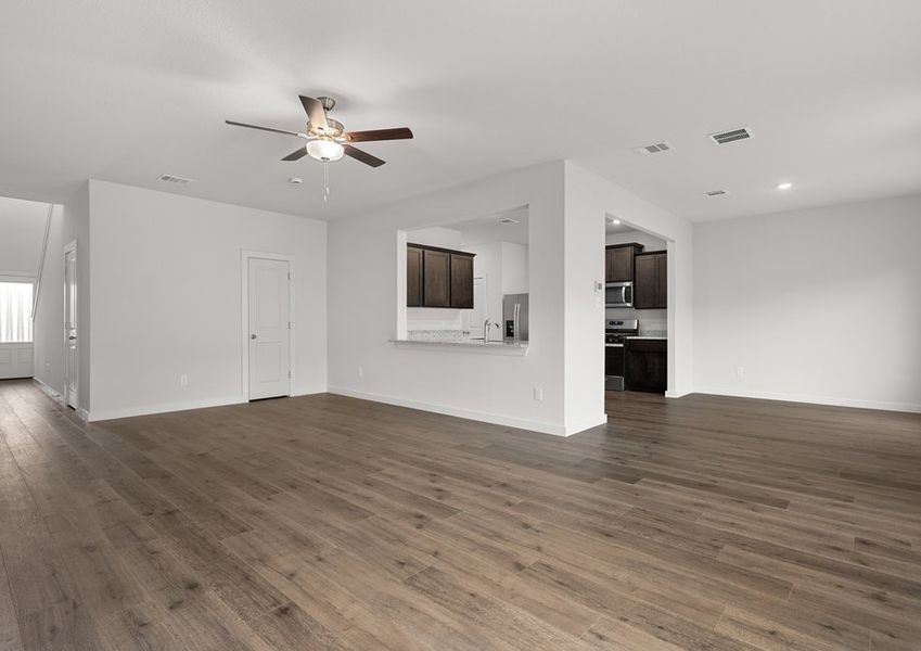 The family room sits right off of the kitchen and living room. The family room sits right off of the kitchen and living room.