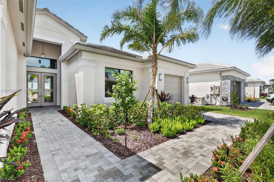 Front exterior of a new home in , Port St. Lucie, FL, highlighting curb appeal (Image 25). Front exterior of a new home in , Port St. Lucie, FL, highlighting curb appeal (Image 25).