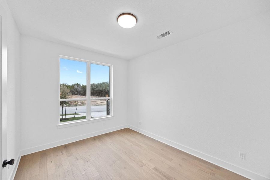 Spacious, unfurnished interior of a new home in Parkside On The River, Georgetown (Image 26).