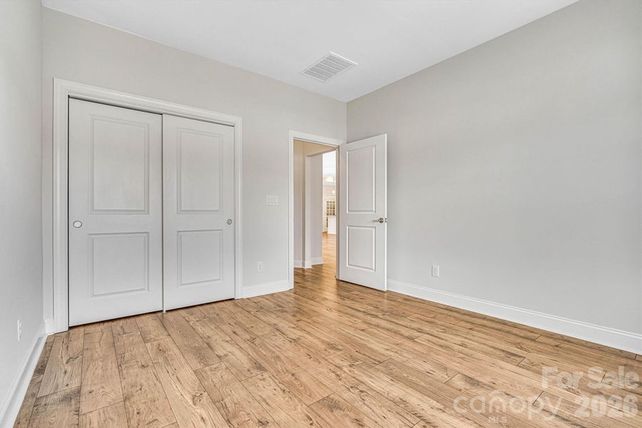 Spacious, unfurnished interior of a new home in The Courtyards at Lake Davidson, Mooresville (Image 38).