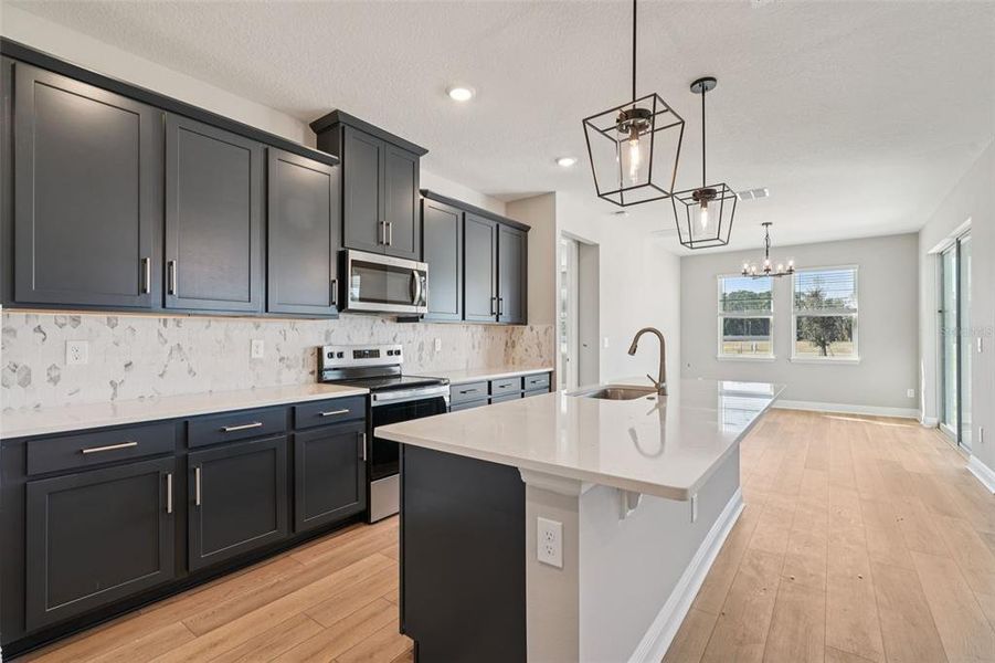 Furnished interior view inside a new home in Legends Preserve - Signature Series, Daytona Beach (Image 10). Furnished interior view inside a new home in Legends Preserve - Signature Series, Daytona Beach (Image 10).