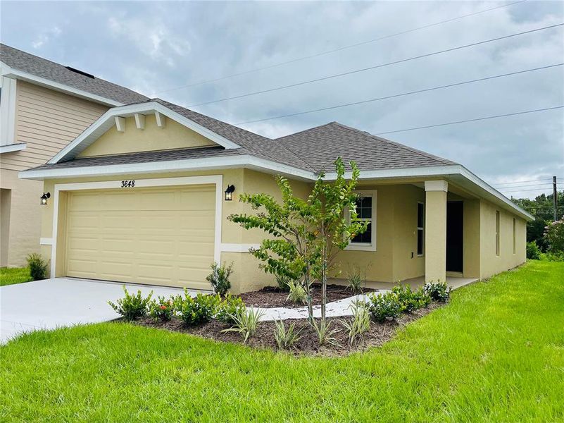 Front exterior of a new home in , St. Cloud, FL, highlighting curb appeal (Image 1). Front exterior of a new home in , St. Cloud, FL, highlighting curb appeal (Image 1).