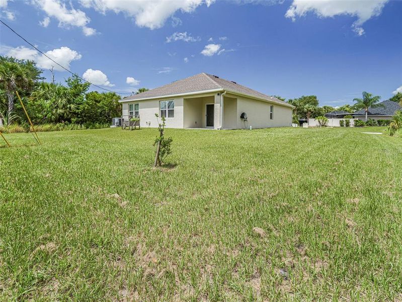 Front exterior of a new home in , Palm Bay, FL, highlighting curb appeal (Image 20). Front exterior of a new home in , Palm Bay, FL, highlighting curb appeal (Image 20).