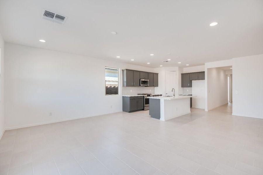 Representative unfurnished interior of a home built from the Quartz by Taylor Morrison in Artisan at Asante Discovery Collection, Surprise (Image 11). Representative unfurnished interior of a home built from the Quartz by Taylor Morrison in Artisan at Asante Discovery Collection, Surprise (Image 11).