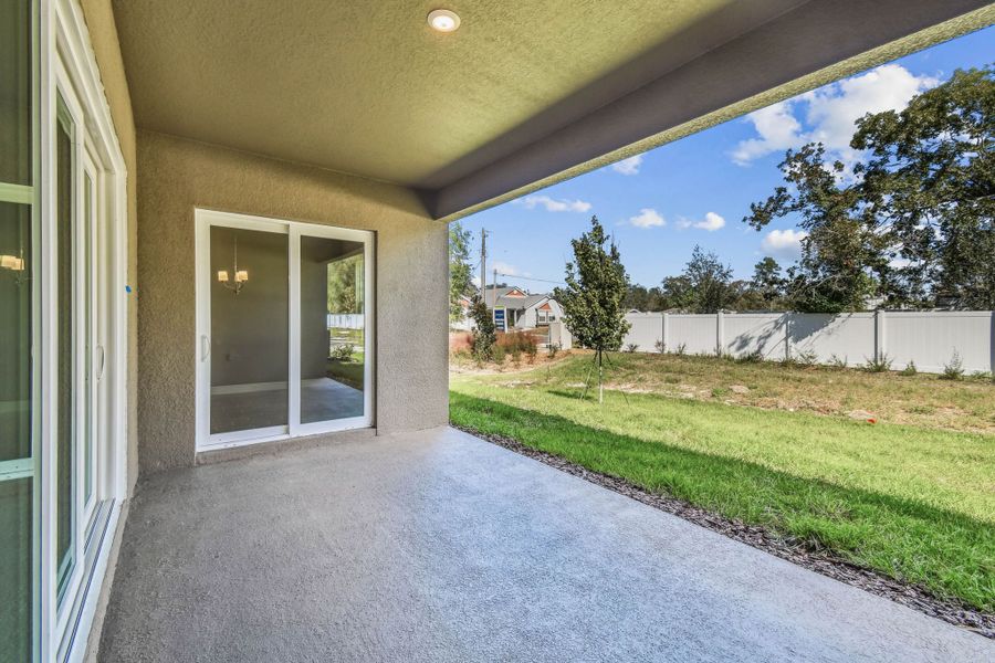 Exterior details and patio area of a home in Pinecone Reserve, Brooksville (Image 30).