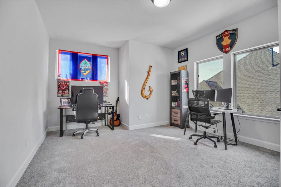 Furnished interior view inside a new home in Bridgeland 55', Cypress (Image 2).