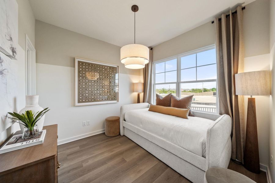 Photo of Pulte model home with same floor plan, not of actual home listed.