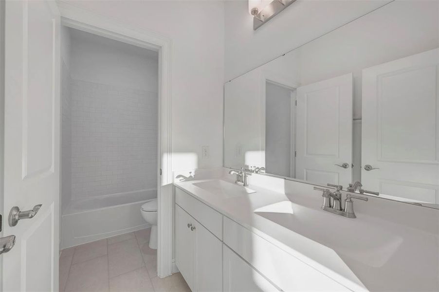 Furnished interior view inside a new home in Kreymer at the Park, Wylie (Image 9).