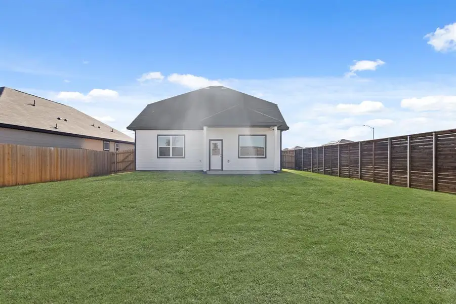 Exterior details and patio area of a home in Retreat at Fossil Creek, Fort Worth (Image 2). Exterior details and patio area of a home in Retreat at Fossil Creek, Fort Worth (Image 2).
