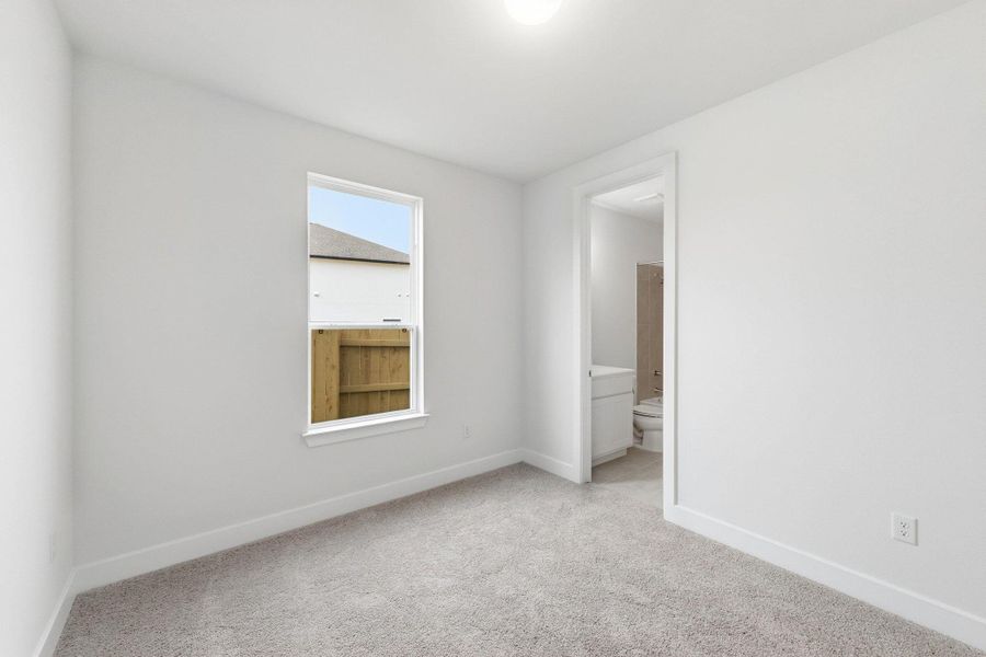 Spacious, unfurnished interior of a new home in The Colony, Bastrop (Image 23).