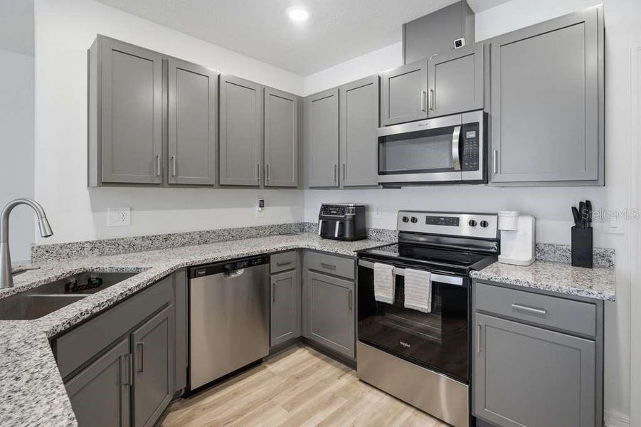 Furnished interior view inside a new home in , Davenport (Image 9).