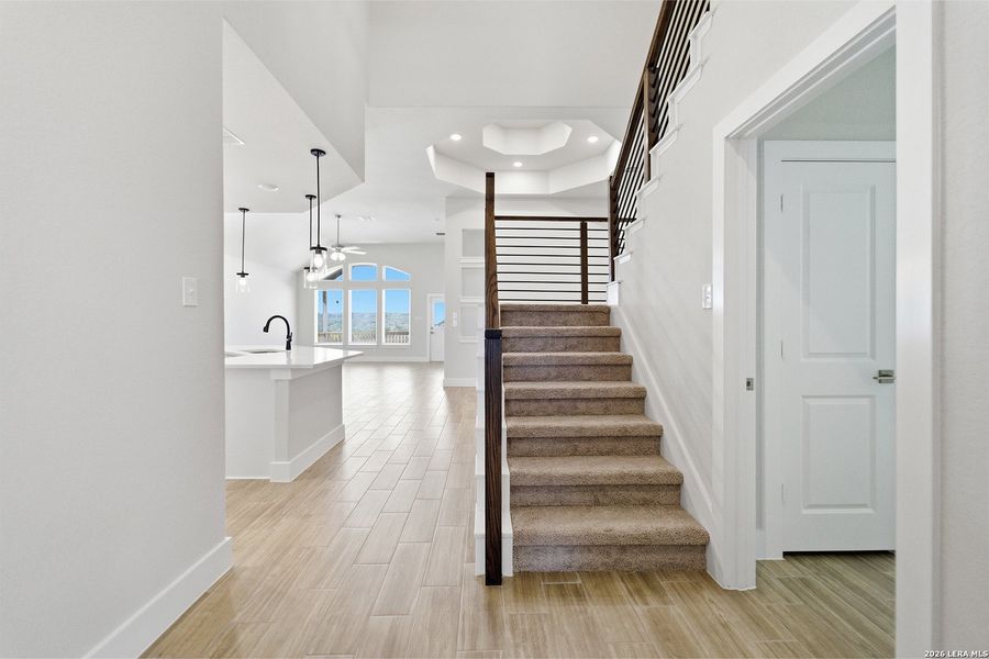 Spacious, unfurnished interior of a new home in The Woodlands at Medina Hills, Mico (Image 33).