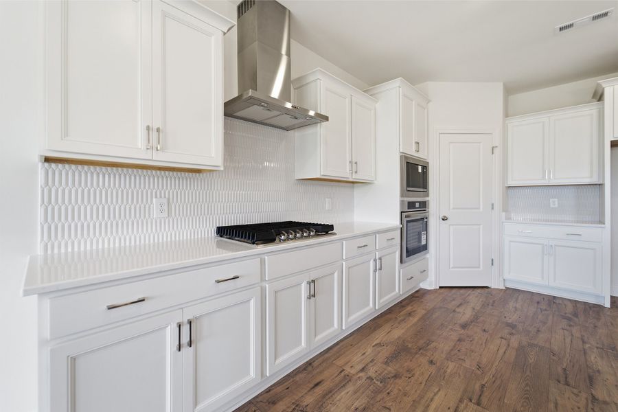 Furnished interior view inside a new home in Aden Woods, Fairview (Image 11).