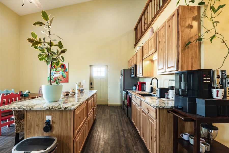 Gorgeous cabinets, countertops and island featured in the kitchen area Gorgeous cabinets, countertops and island featured in the kitchen area