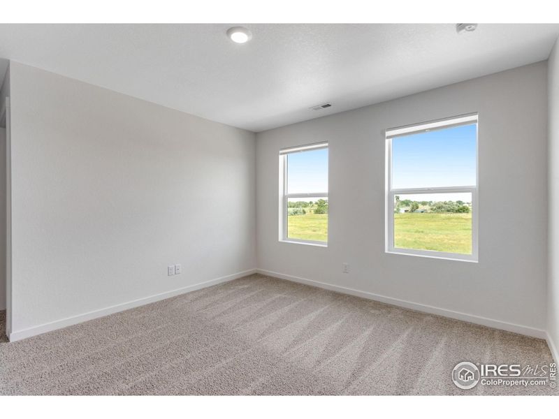 Spacious, unfurnished interior of a new home in Vista Meadows, Fort Lupton (Image 13).