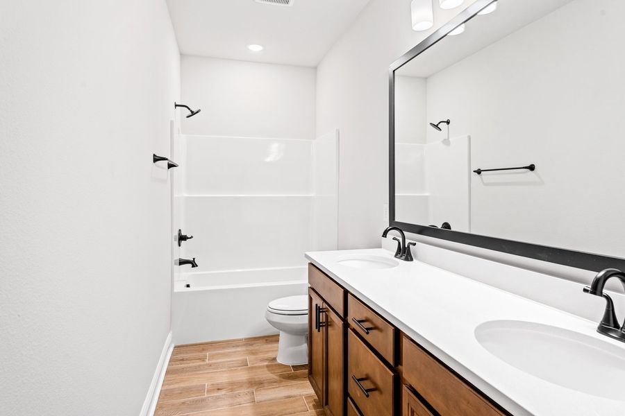 Furnished interior view inside a new home in The Bluffs at Lafayette, Freeport (Image 10).