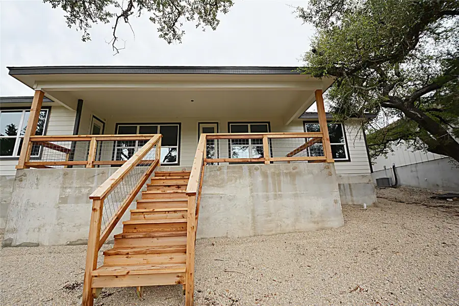 Front exterior of a new home in , Fischer, TX, highlighting curb appeal (Image 2).