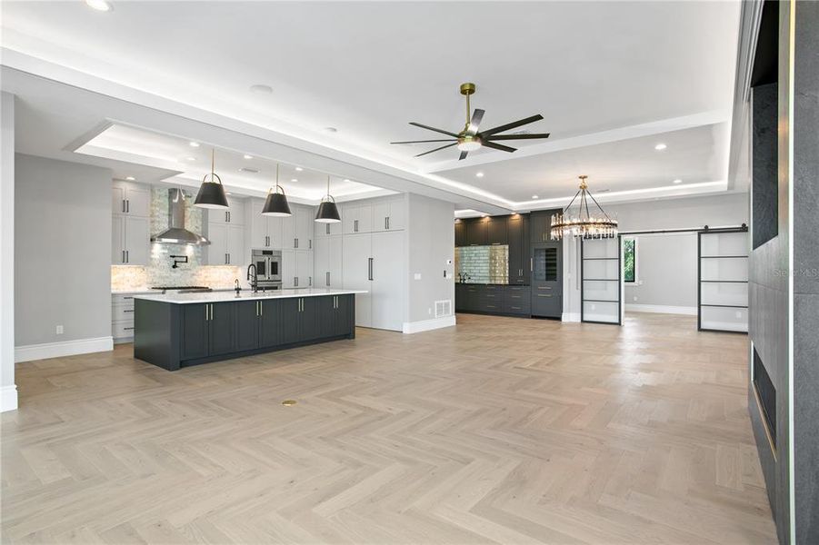 Living/Dining/Kitchen combo with wet bar and gas fire place