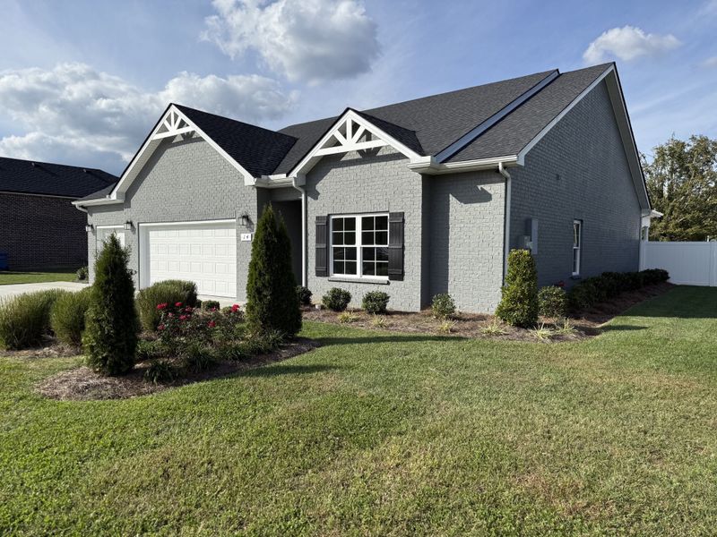 Front exterior of a new home in Fox Run, Manchester, TN, highlighting curb appeal (Image 2). Front exterior of a new home in Fox Run, Manchester, TN, highlighting curb appeal (Image 2).
