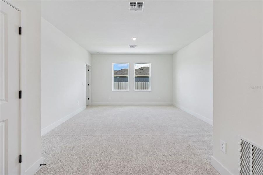 Spacious, unfurnished interior of a new home in Coasterra, Palmetto (Image 42).