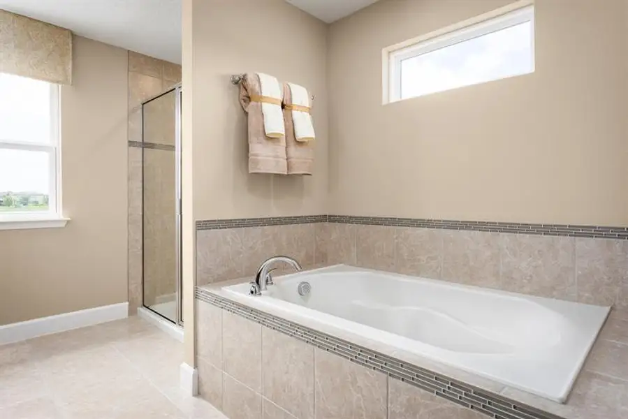 Representative furnished interior of a home built from the Rochelle by Ryan Homes in Bellaviva, Auburndale (Image 14).