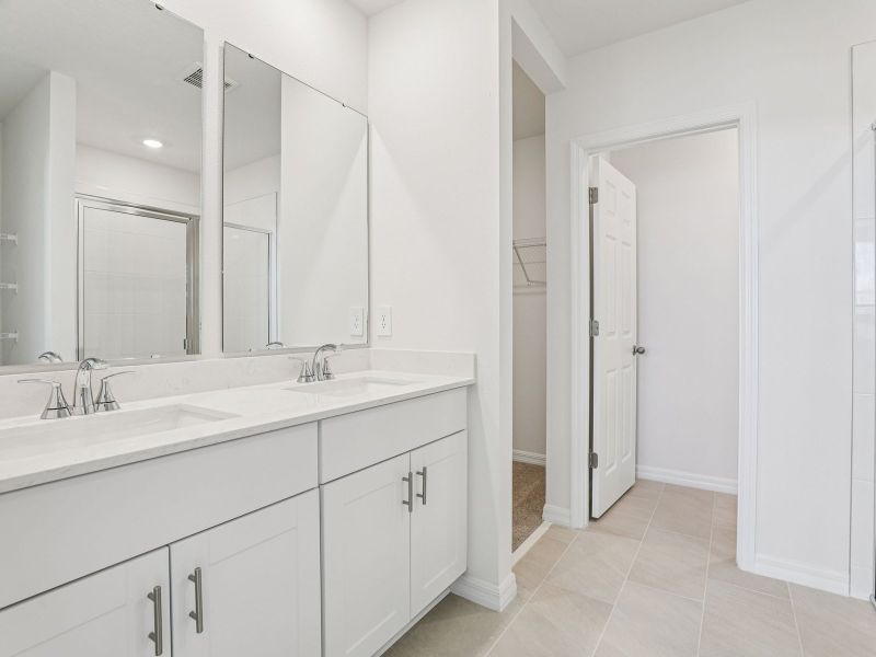 Furnished interior view inside a new home in Lake Deer Estates - Signature Series, Poinciana (Image 6).