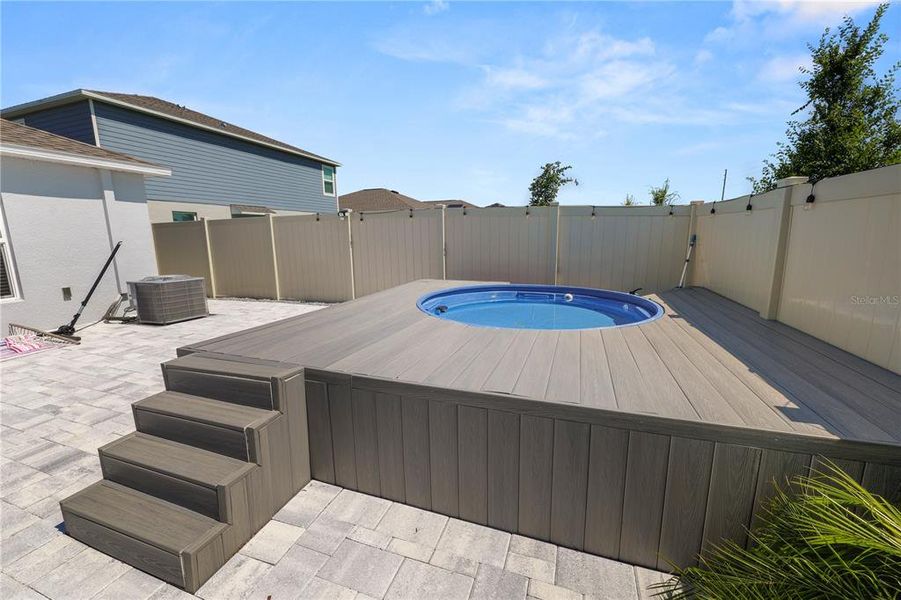 Exterior details and patio area of a home in Hunt Club Groves, Lake Wales (Image 33).