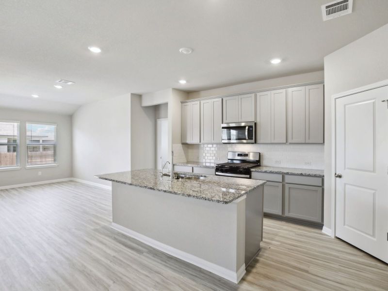 Spend some time cooking or baking in this beautiful kitchen.