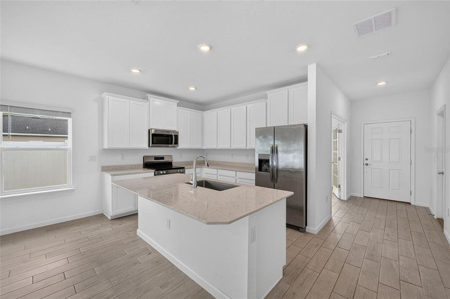 Furnished interior view inside a new home in Heath Preserve, Ocala (Image 9).