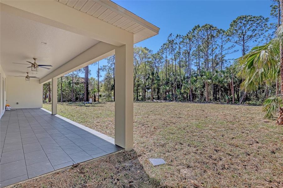 Front exterior of a new home in , Mims, FL, highlighting curb appeal (Image 24).